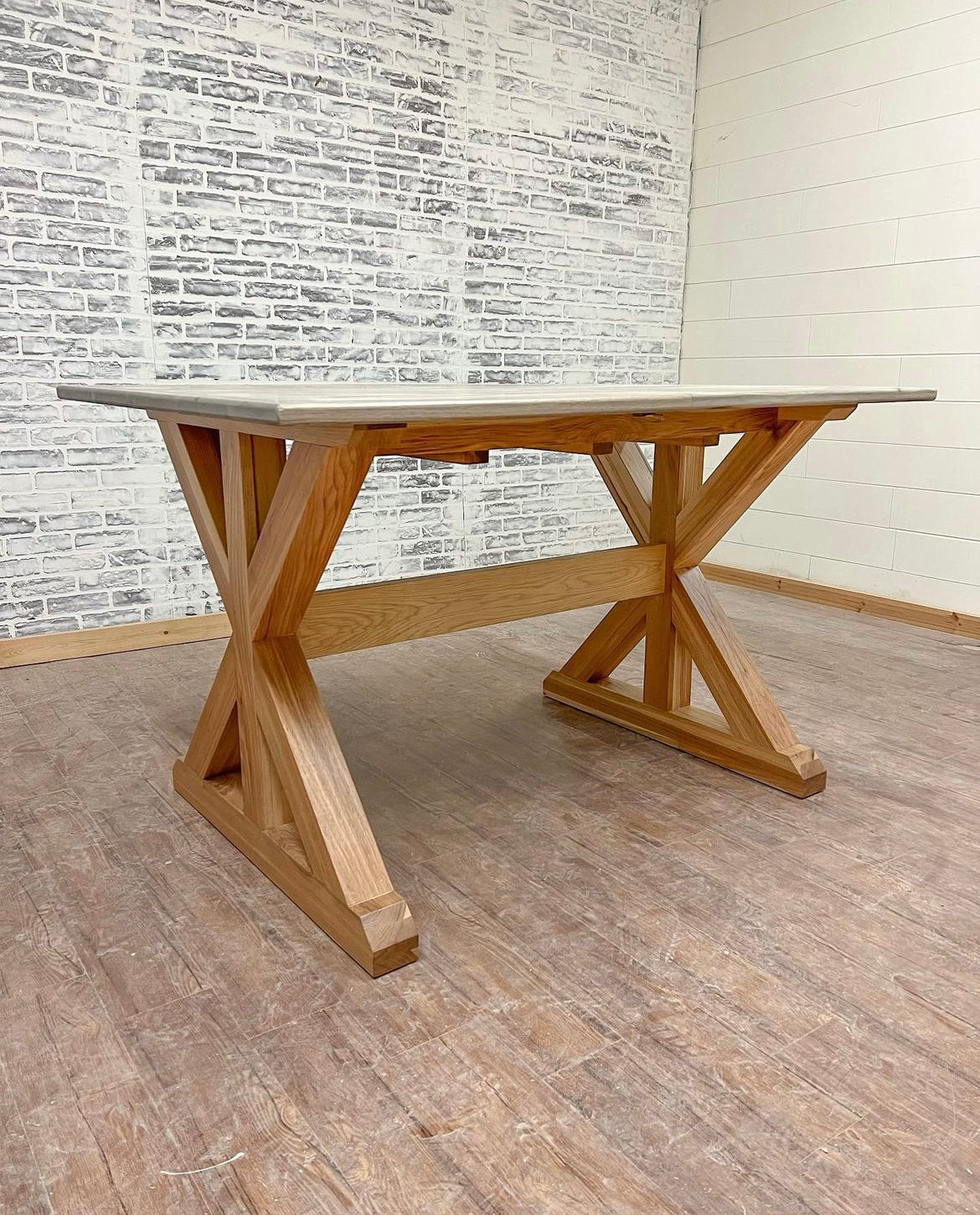 Pictured with a 5' L x 42" W Hickory table with a Classic Gray stained top and a Natural finish on the base.