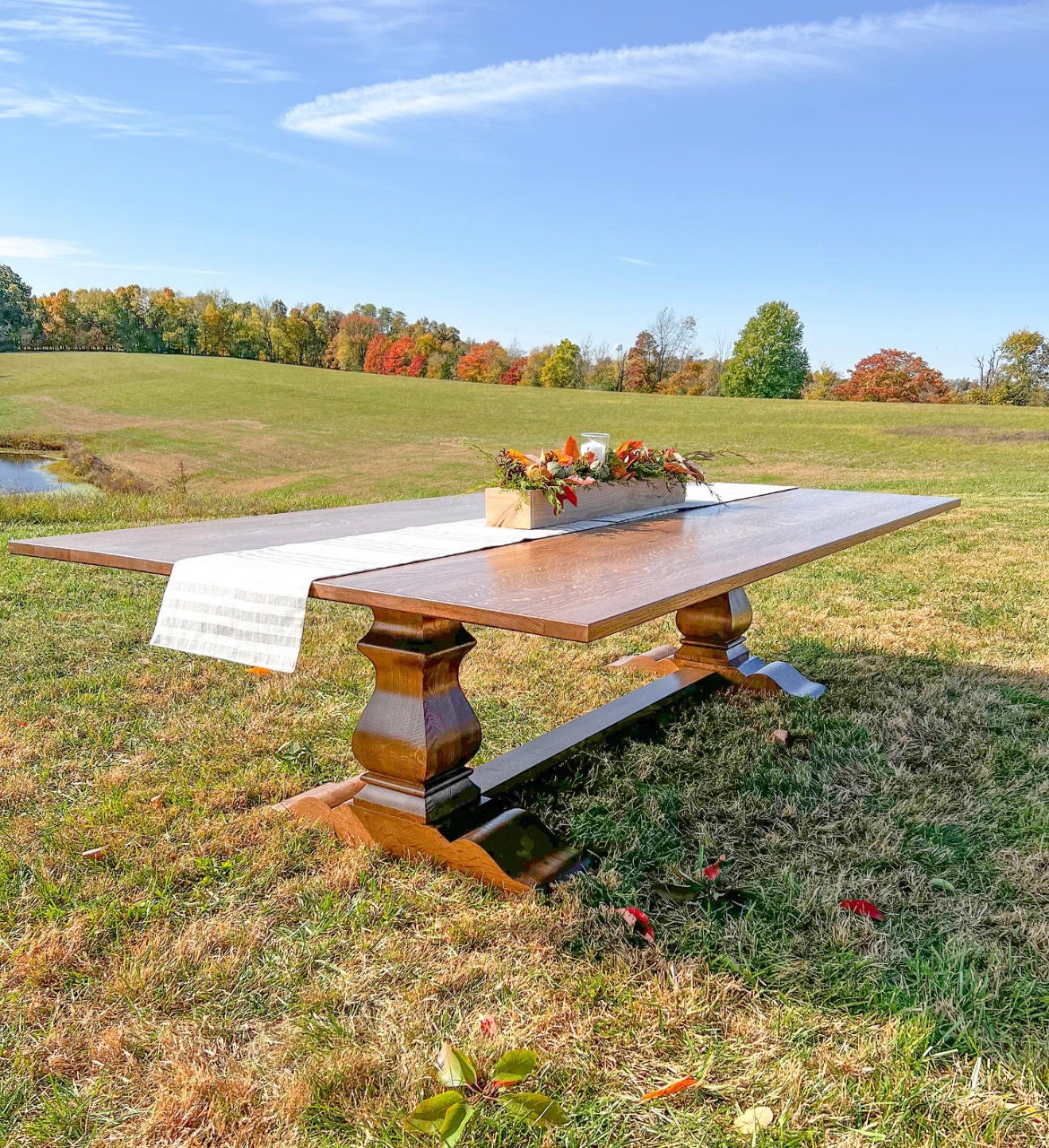 Pictured with a 10' L x 60" W Solid Quarter Sawn White Oak table stained in Honey.
