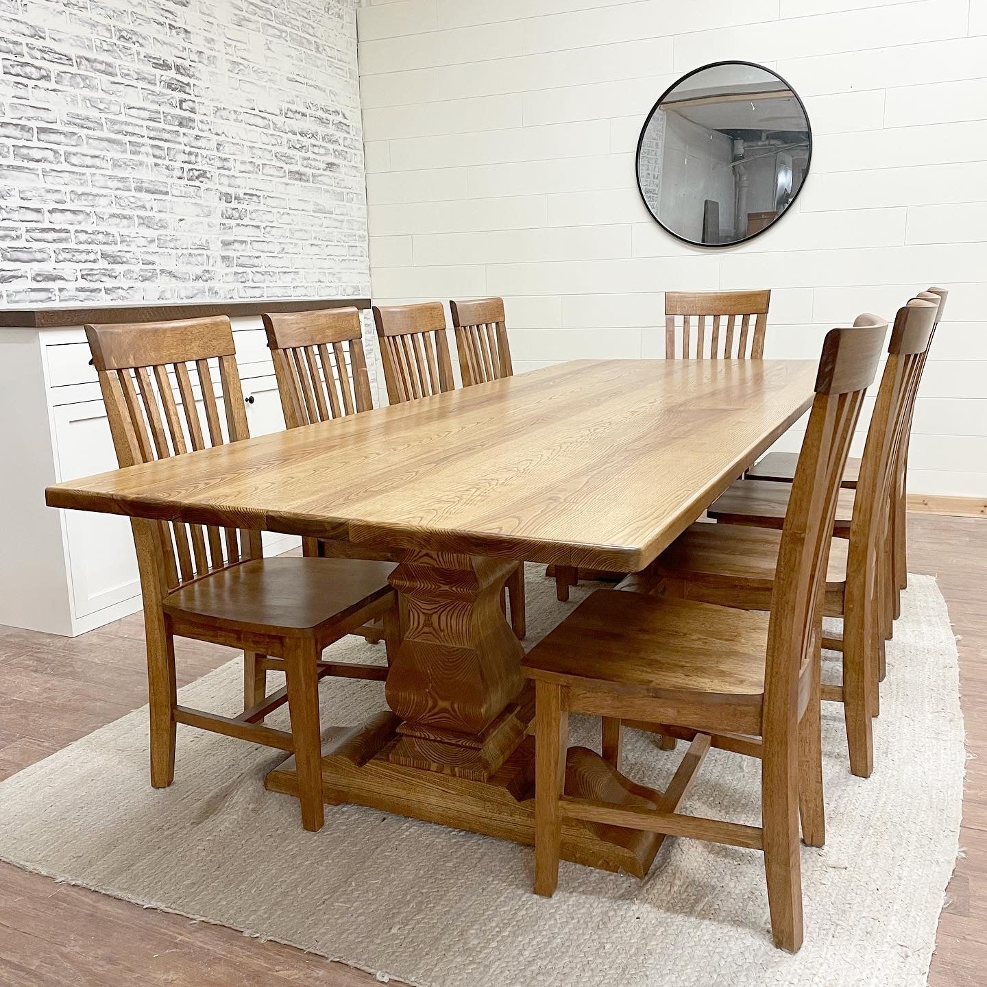 Pictured with a 9' L x 42" W Ash top with rounded corners stained Early American.