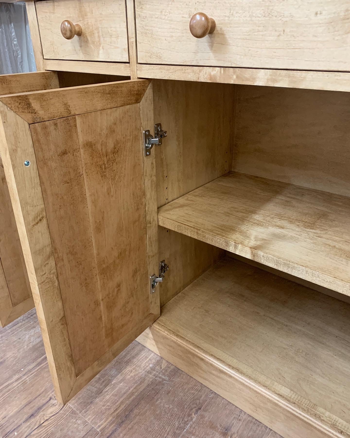 Pictured with a 60" L x 18" D x 36" T server in Hard Maple stained Early American.