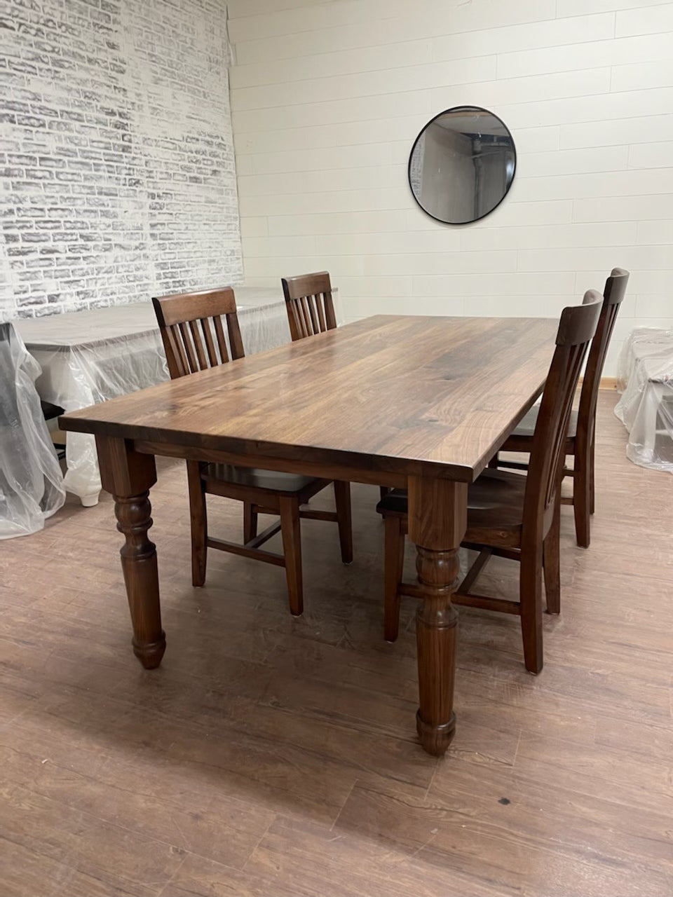 Pictured with a 6' L x 42" W solid Walnut table with a Natural Finish. Pictured with four Mission Chairs.