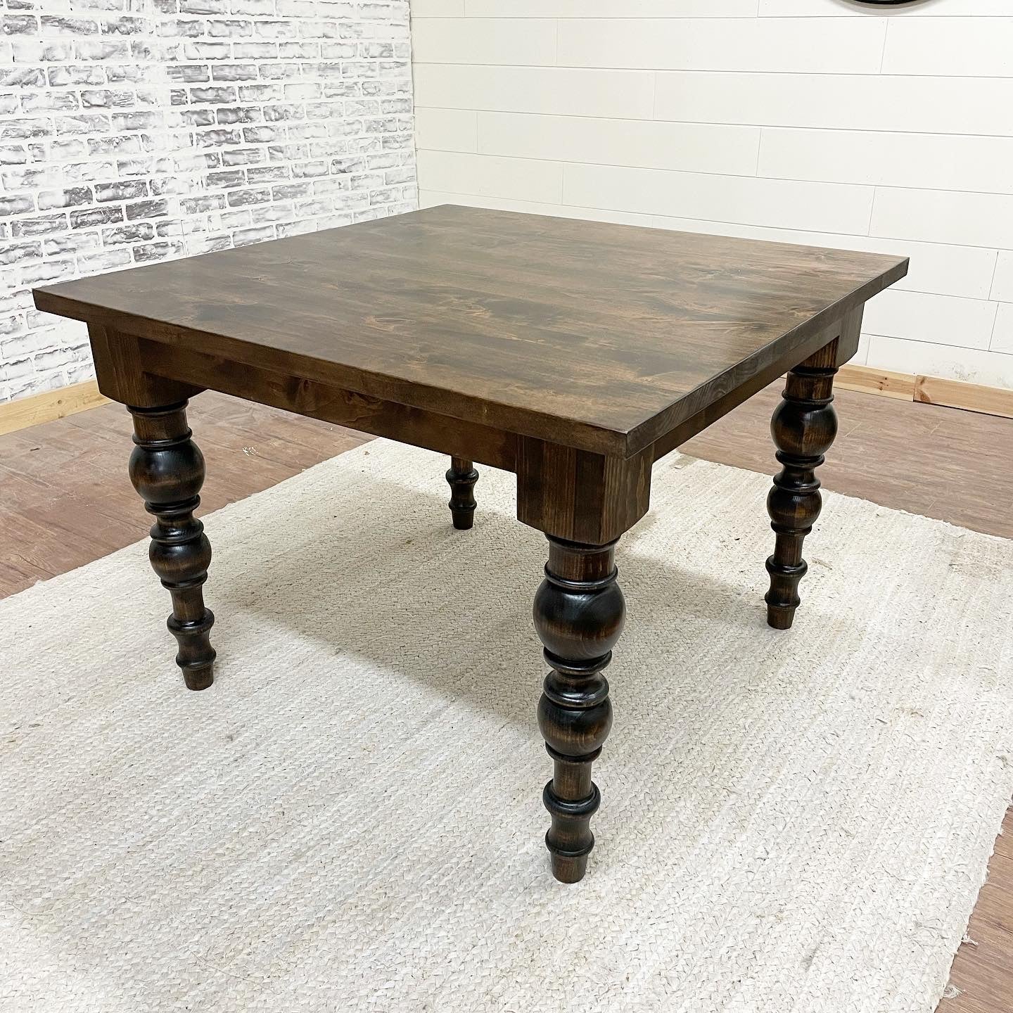 Pictured with a 42" L x 42" W Rustic Alder table stained Espresso.