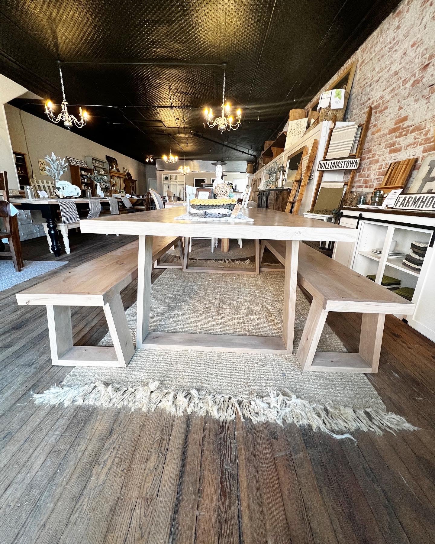 Pictured with a 7' L x 42" W Rustic Alder stained Weathered Oak. Pictured with two Matching Benches.