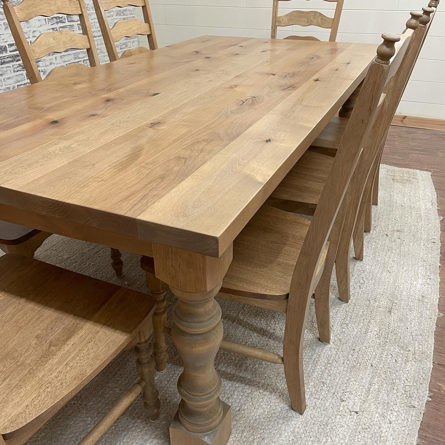 Pictured with an 8' L x 42" W Rustic Alder top and Pine legs stained Weathered Oak. Pictured with 8 Maine Ladder Back Chairs.