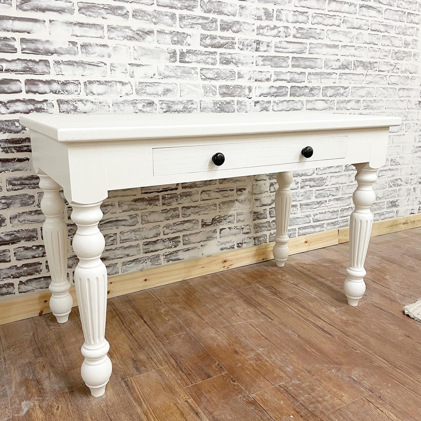 Pictured with a 48" L x 24" W desk painted all white.