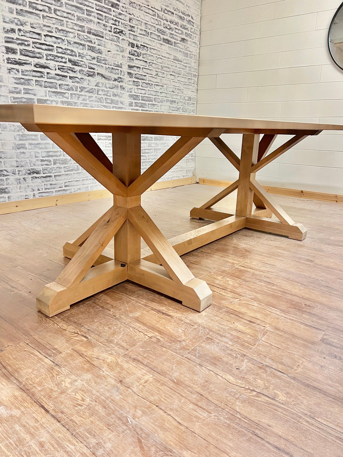 Pictured with a 9' L x 42" W Rustic Alder table stained Weathered Oak.