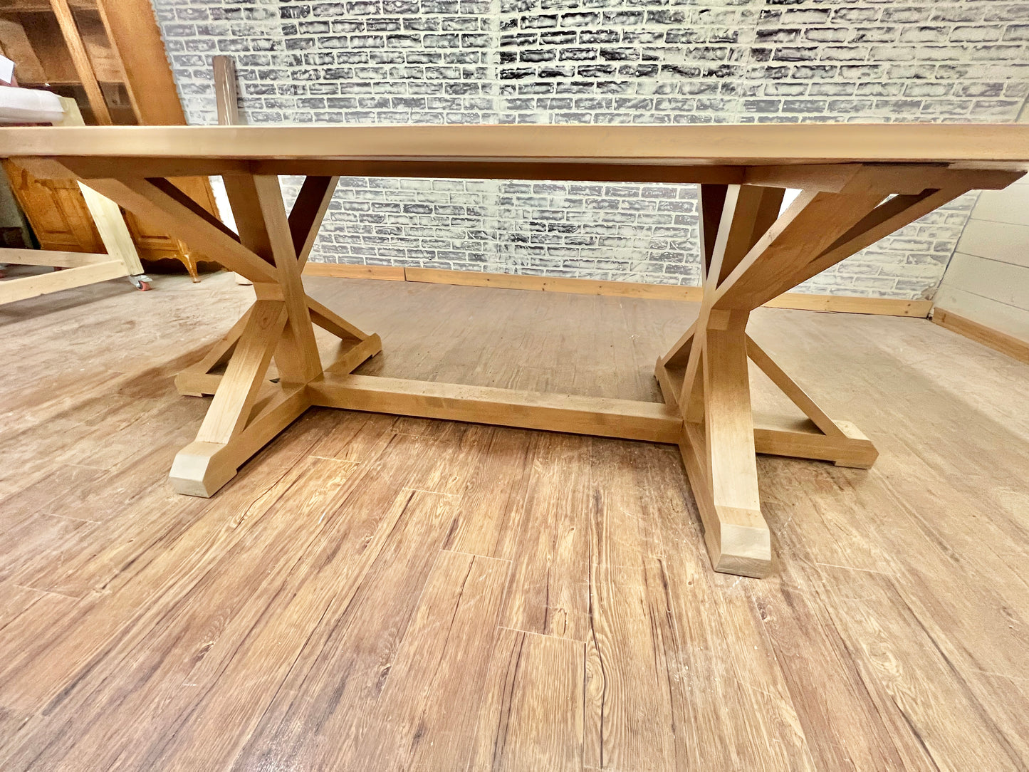 Pictured with a 9' L x 42" W Rustic Alder table stained Weathered Oak.