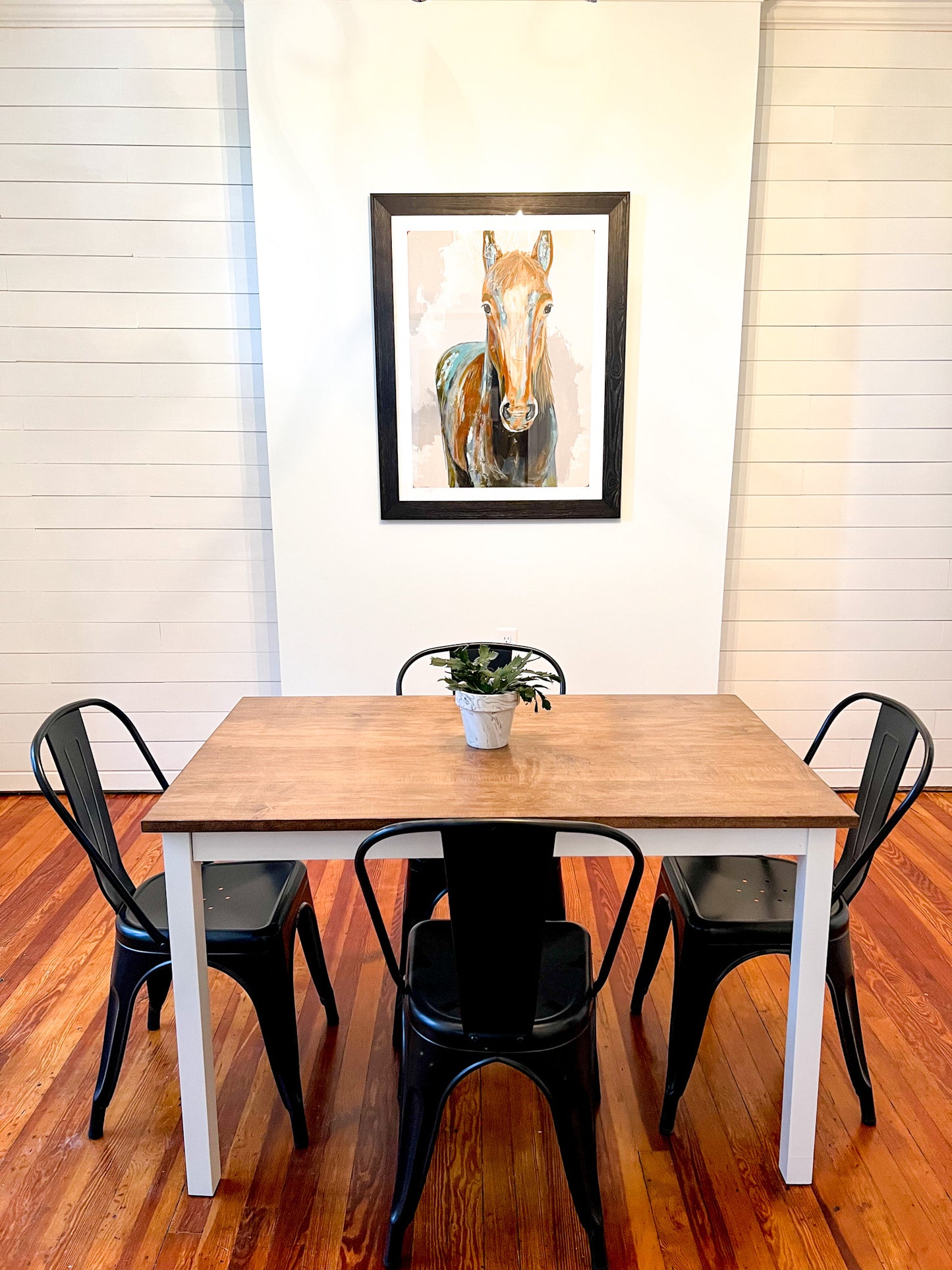 Pictured with a 48" L x 30" W hard maple table with Espresso stain and white painted base. Also pictured with 4 metal dining chairs.