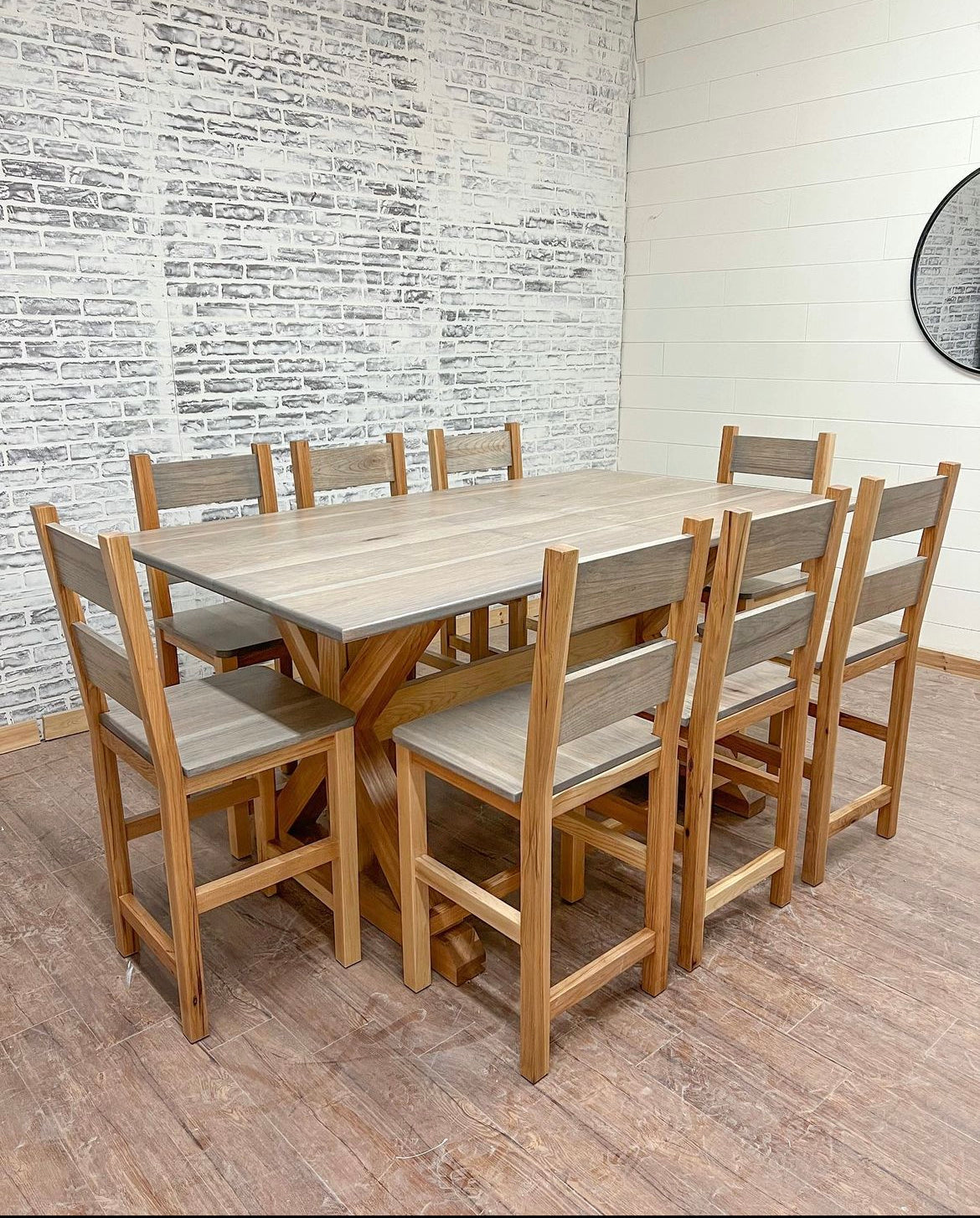 Pictured with a 6' L (with the 12" Leaf) x 42" W Hickory table with a Classic Gray stained top and a Natural finish on the base. Pictured with 8 Counter Height Jase Stools in Hickory.