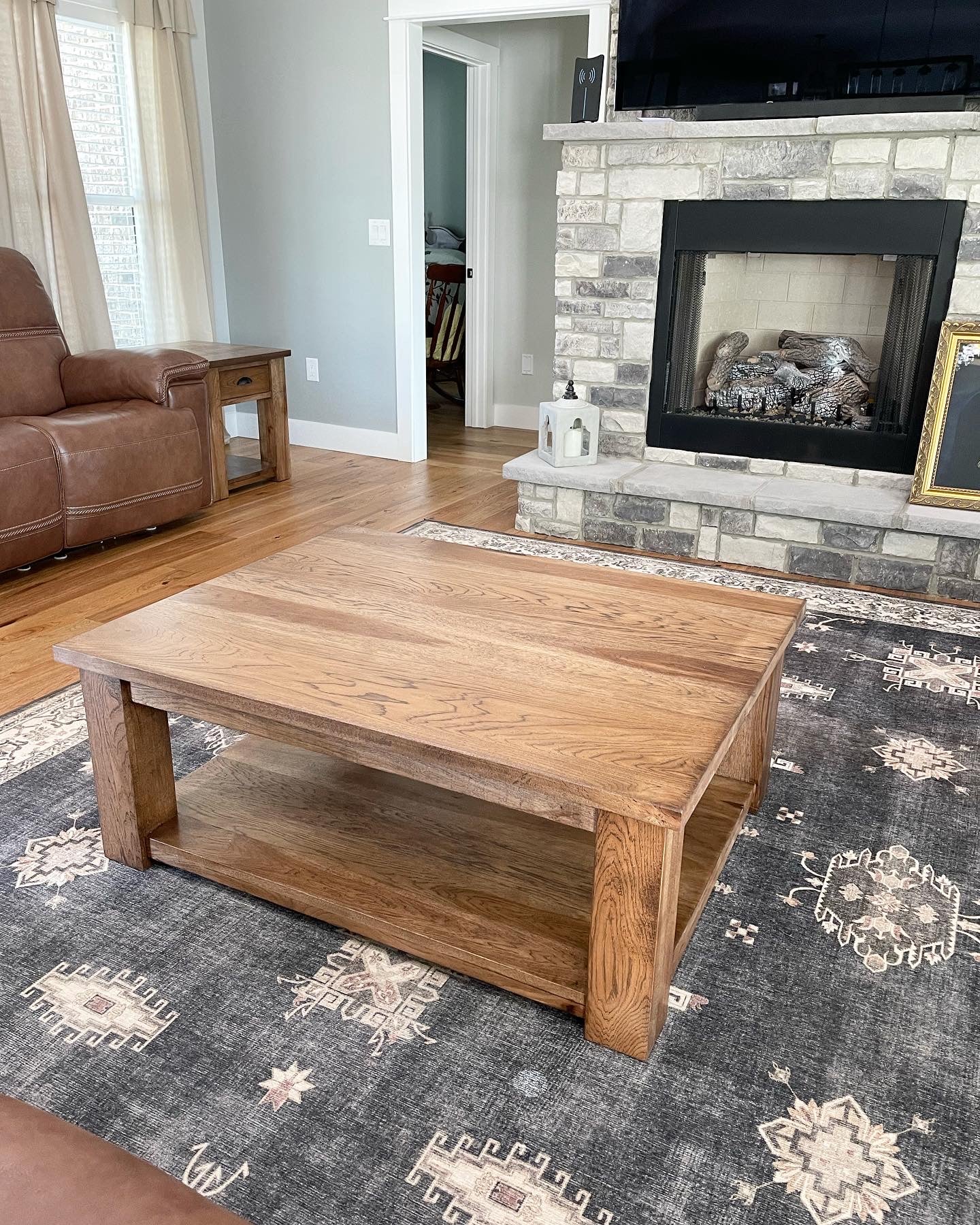 Pictured with a 42" L x 36" W Hickory table with Honey Stain.