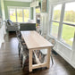Pictured is a 7' L x 36" W Hard Maple table with a Natural Finish. Pictured is 6 Metal Chairs in a Gun Finish.