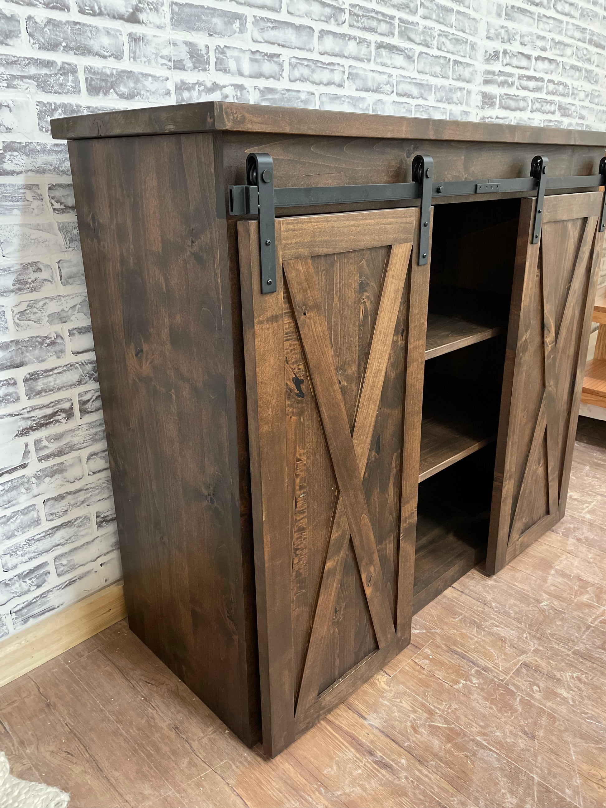 Pictured is a 48" L x 35" T x 18" D console made in solid Rustic Alder and stained Espresso.