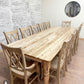 Pictured with a 10' L x 42" W Ambrosia Maple table in a Natural Finish. Pictured with 12 Double Cross Back Chairs.