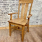 Pictured with the Ava Arm chair in Early American stain.