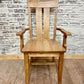 Pictured with the Ava Arm chair in Early American stain.