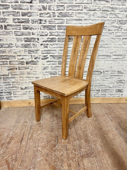 Pictured with the Ava Dining Chair in Early American stain.