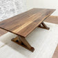 Picutred with a 7' L x 42" W Walnut table with a Natural Finish.