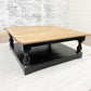 Pictured with a 48" x 48" Red Oak top with a Natural Finish and a painted Black base.