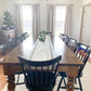 Pictured with a 9' L x 42" W Rustic Alder top with Pine legs stained Early American. Pictured with 10 Lexington Windsor Dining Chairs stained Black.