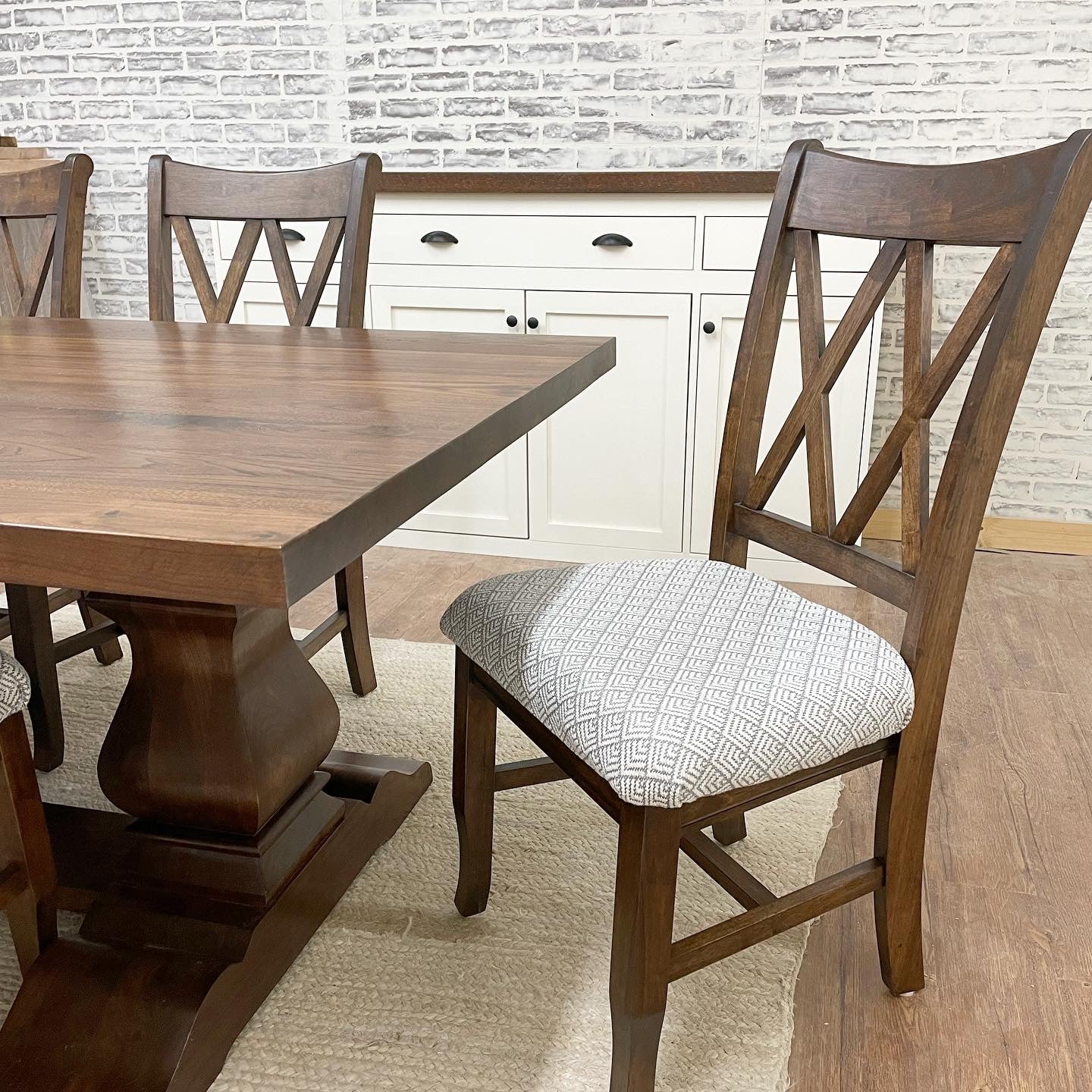 Pictured with a 7' L x 42" W Walnut dining table stained Honey. Pictured with Double Cross Back Chair with matching stain and upholstered seat with fabric provided by client.