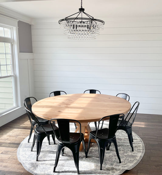 Pictured is a 72" W Rustic Alder table is a Natural Finish. Pictured is 8 Metal Chairs is a Black Finish. 