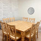 Pictured is a 60" x 60" Rustic Alder table top and Pine Legs with a Natural Finish. Pictured is 8 Double Cross Back Chairs. 