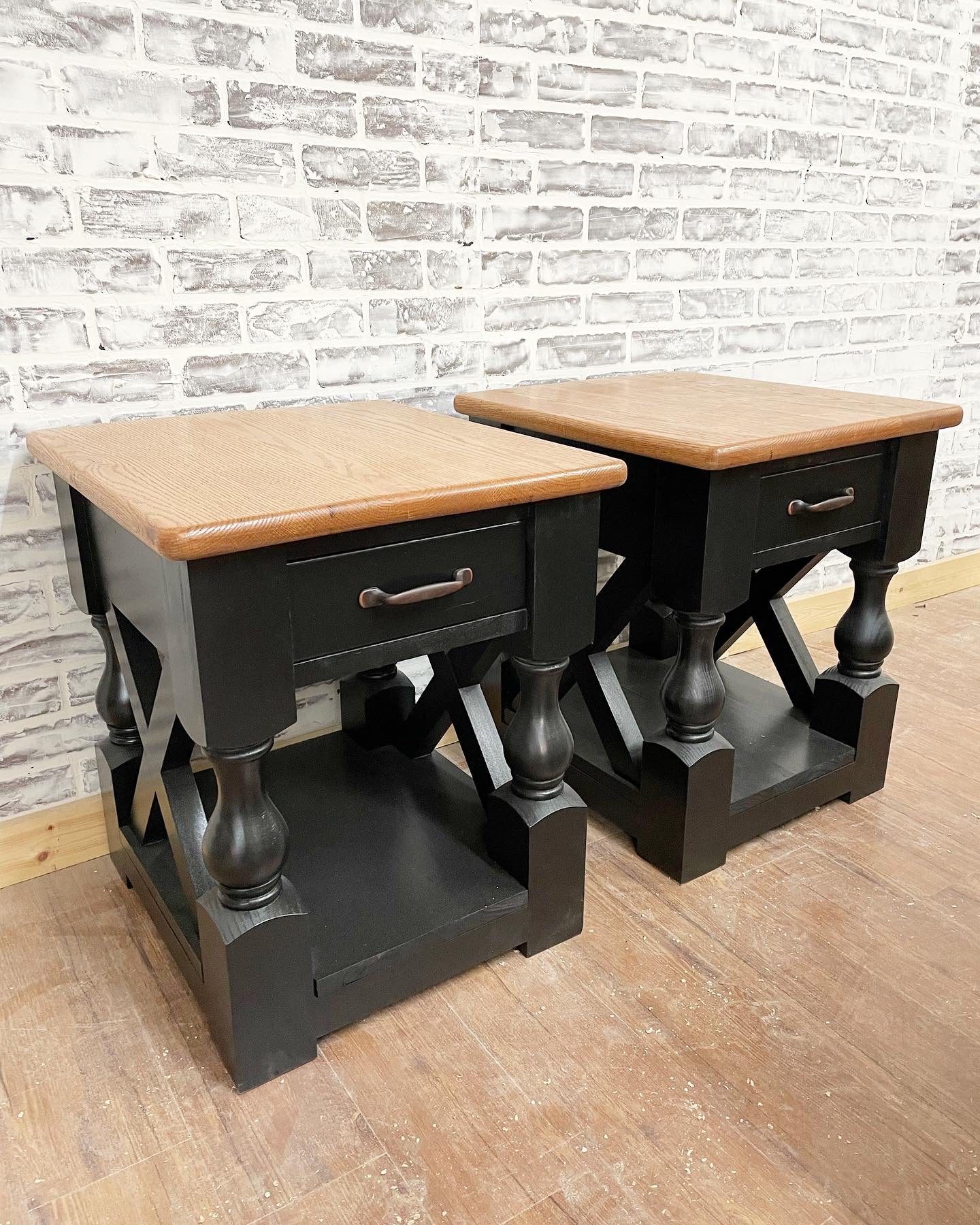 Pictured with two 24" T x 24" W x 24" D end tables with a Red Oak top with a Natural finish and painted black base.