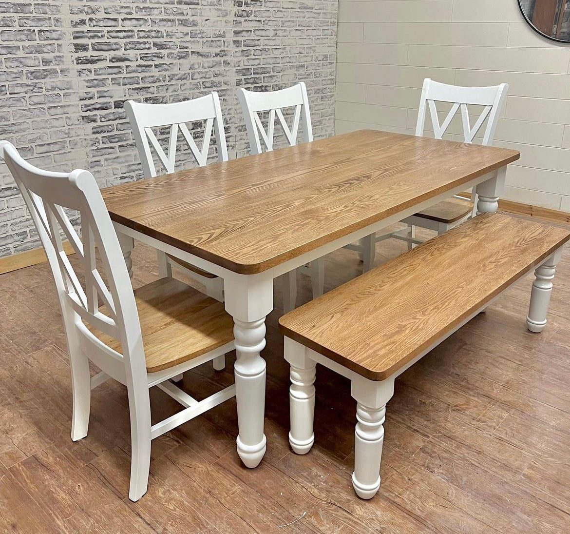 Pictured with a 6' L x 42" W Red Oak top with Rounded Corners stained Early American and a White painted base. Pictured with a Matching Bench and four Double Cross Back Chairs.