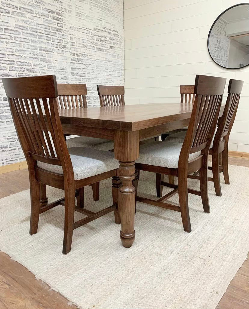 Pictured with a 6' L x 42" W Walnut Table and Base with a Natural finish. Pictured are 6 Seattle Mission Chairs. Upholstered seats was made with fabric provided by client.