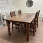Pictured with a 6' L x 42" W solid Walnut table with a Natural Finish. Pictured with four Mission Chairs. 