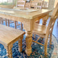 Pictured with a 7'L x 36"W Ambrosia Maple table in a Natural finish. Pictured with a Matching Bench and 5 Magnolia Chairs.