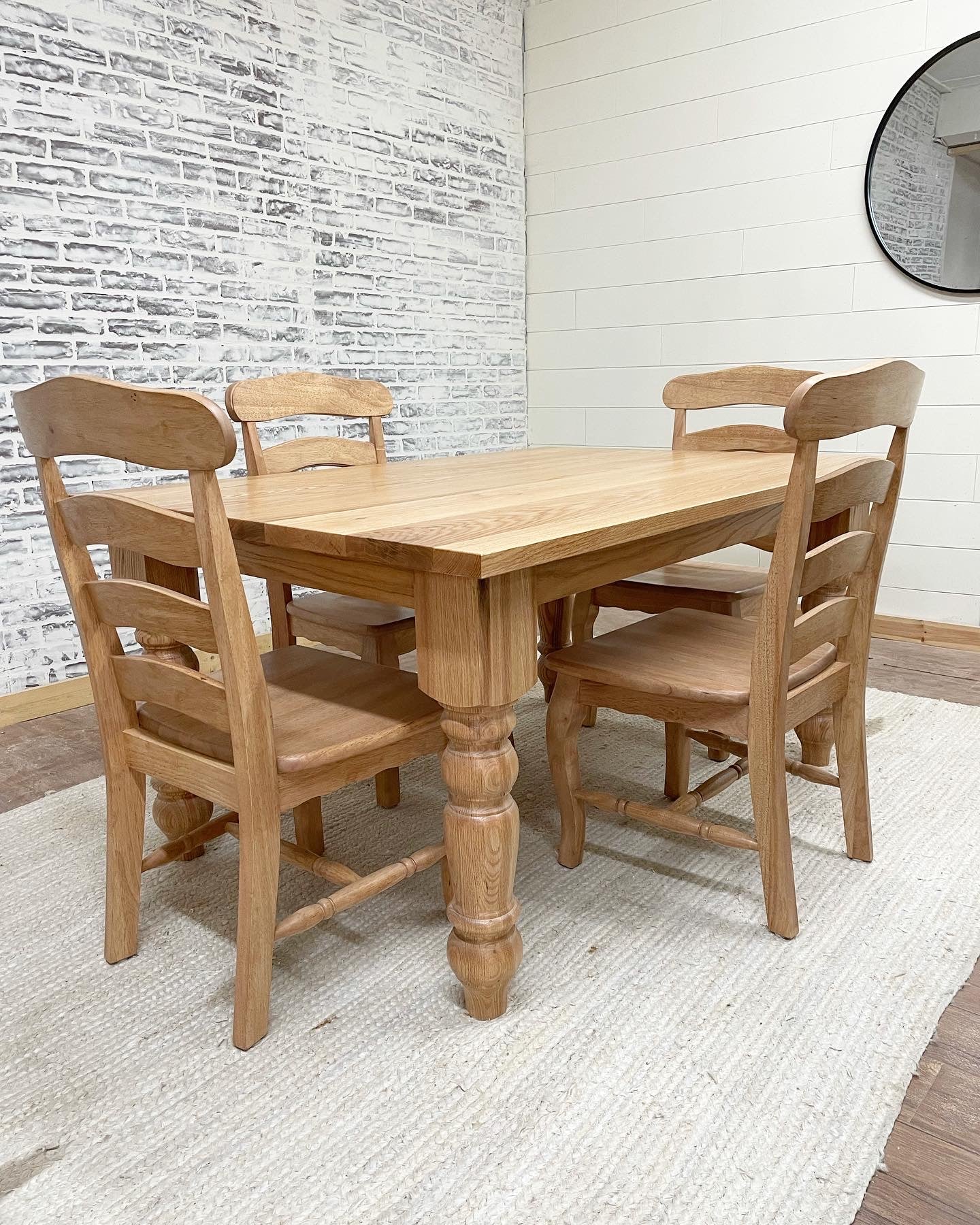 Pictured with a 5'L x 42"W Red Oak table with a Natural Finish. Pictured with 4 French Country Dining Chairs.