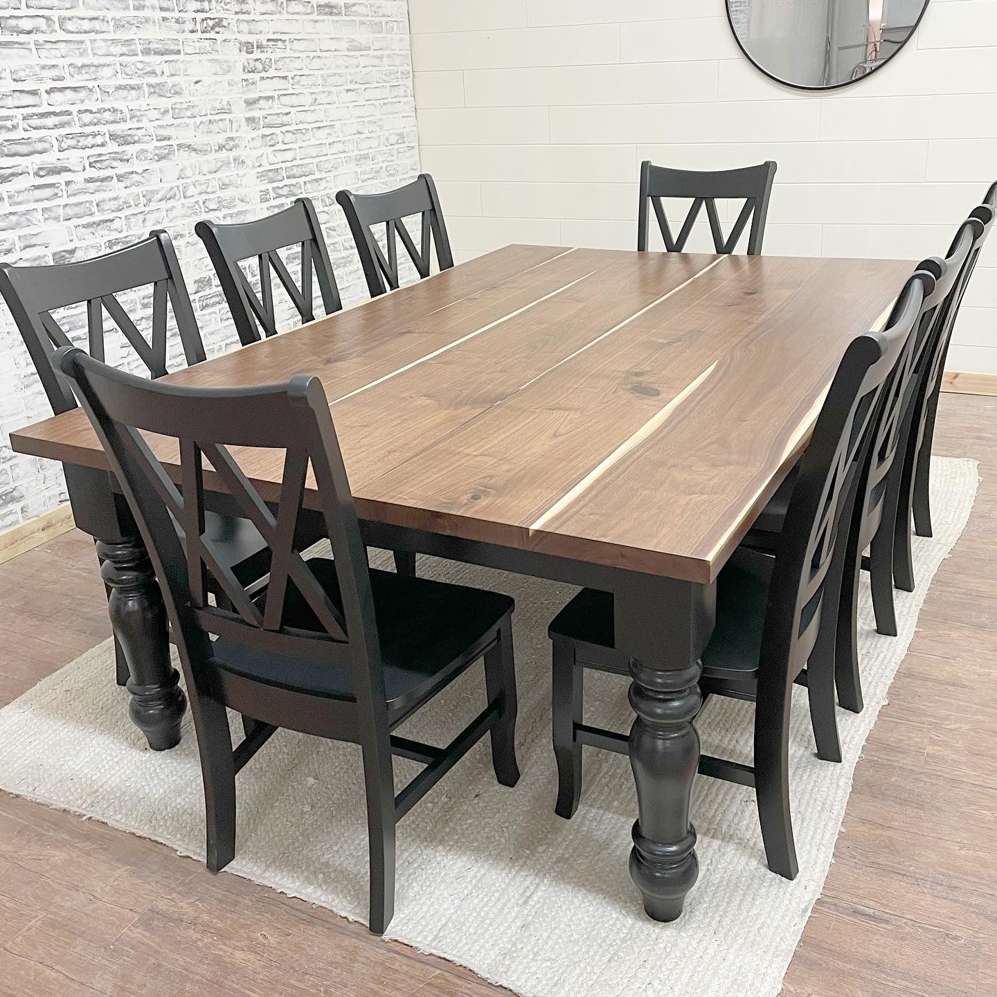 Pictured with a 8' L x 48" W Walnut top with a Natural finish and a Black painted base. Pictured with 8 Double Cross Back Chairs.