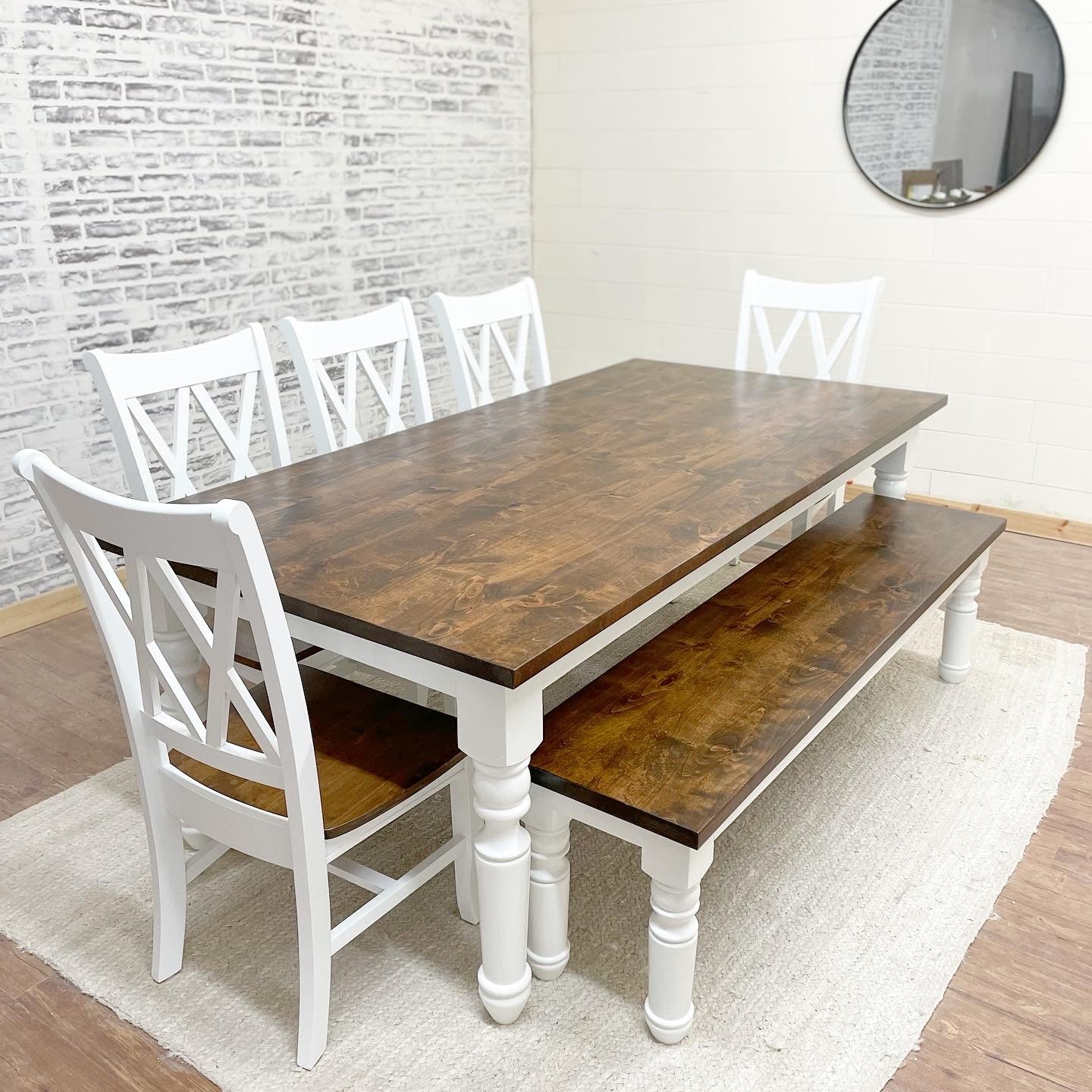 Pictured with an 8' L x 42" W Rustic Alder top stained Honey with a White painted base. Pictured with a matching bench and 5 Double Cross Back Chairs.