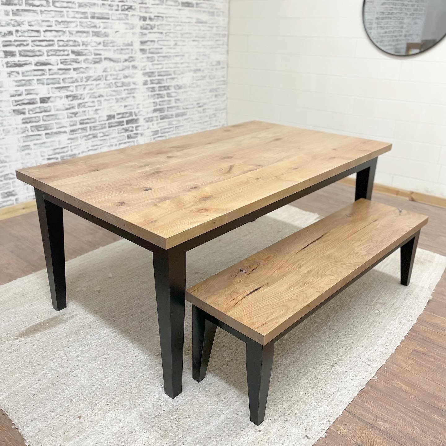 Pictured with a 6' L x 42" W Rustic Alder top stained Weathered Oak and a Black painted base. Pictured with a Matching Bench.