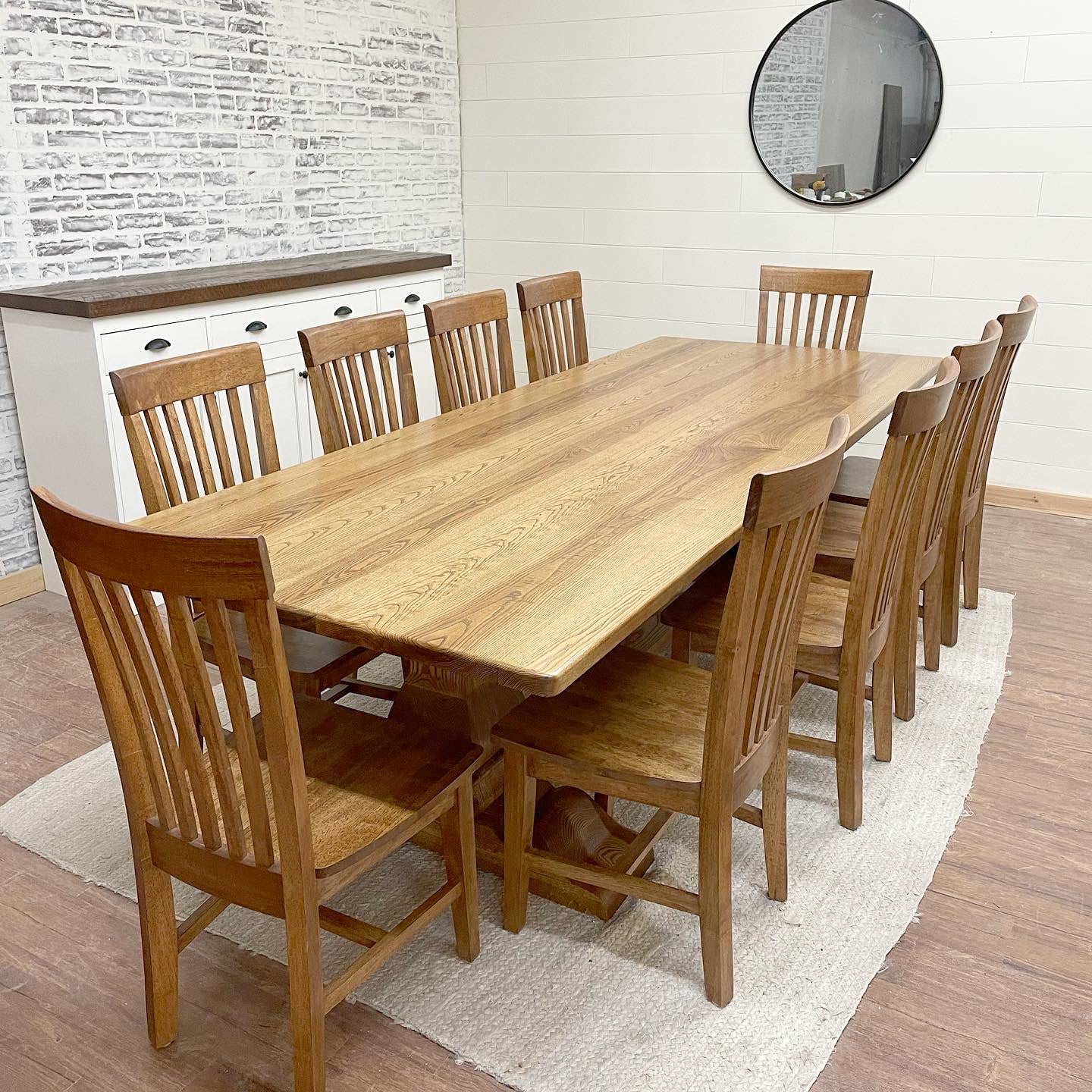 Pictured with a 9' L x 42" W Ash top with rounded corners stained Early American. Pictured with 10 Mission Dining Chairs.