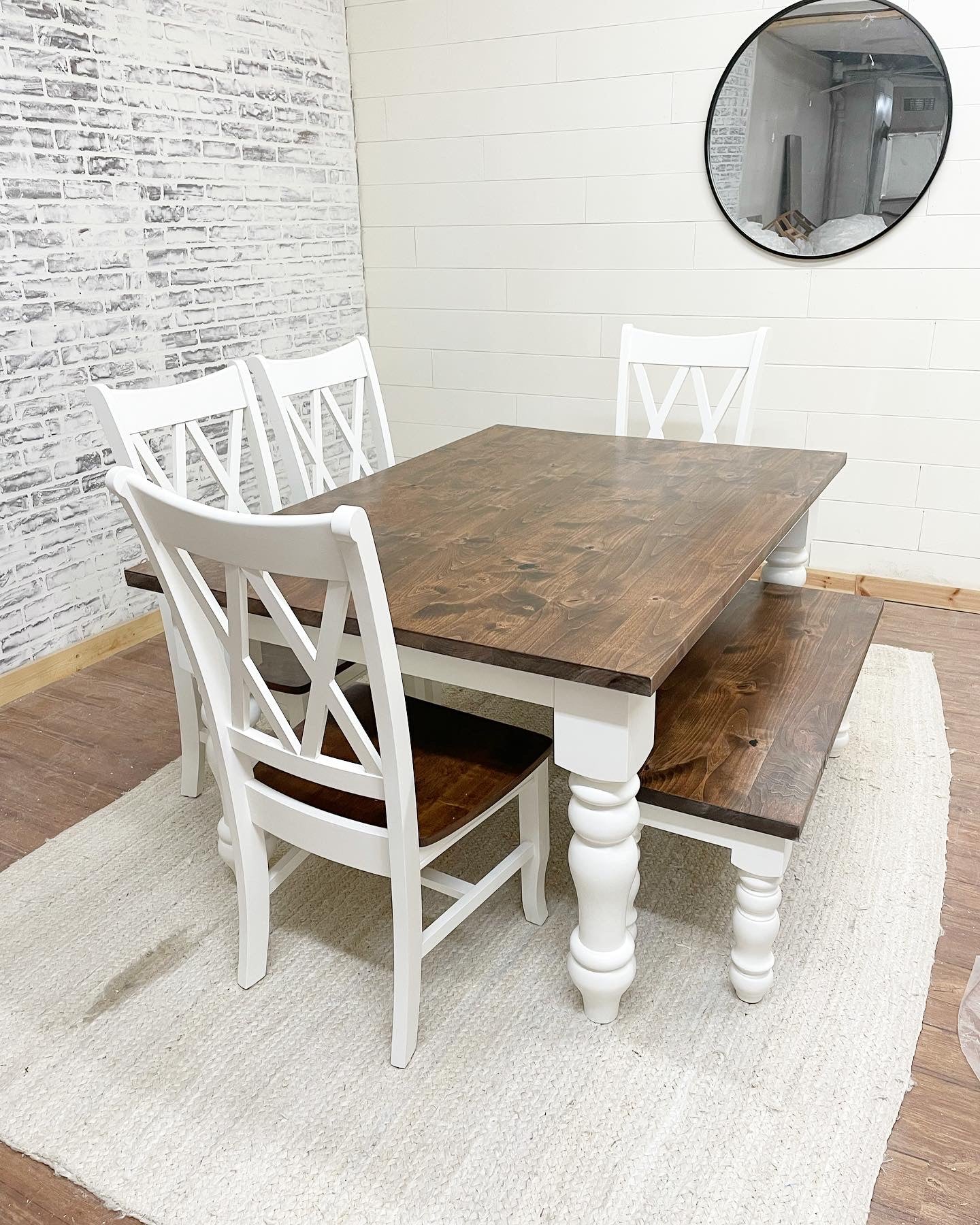 Pictured with a 5'L x 42"W Rustic Alder top stained Espresso with a painted White base. Pictured with a Matching Bench and 4 Double Cross Back Chairs.
