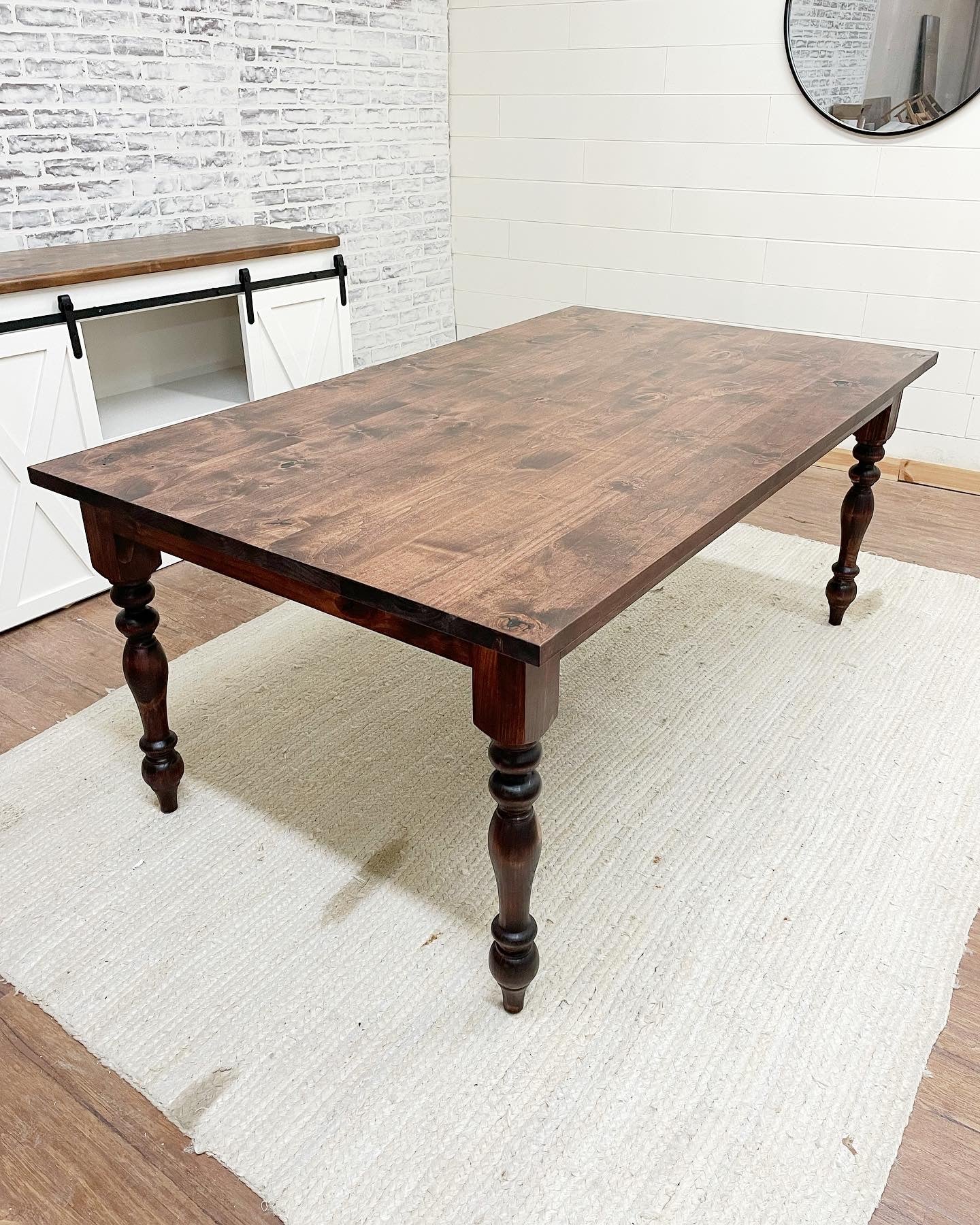 Pictured with a 6' L x 42" W Rustic Alder Top and Pine Legs stained a custom Red Mahagony stain.