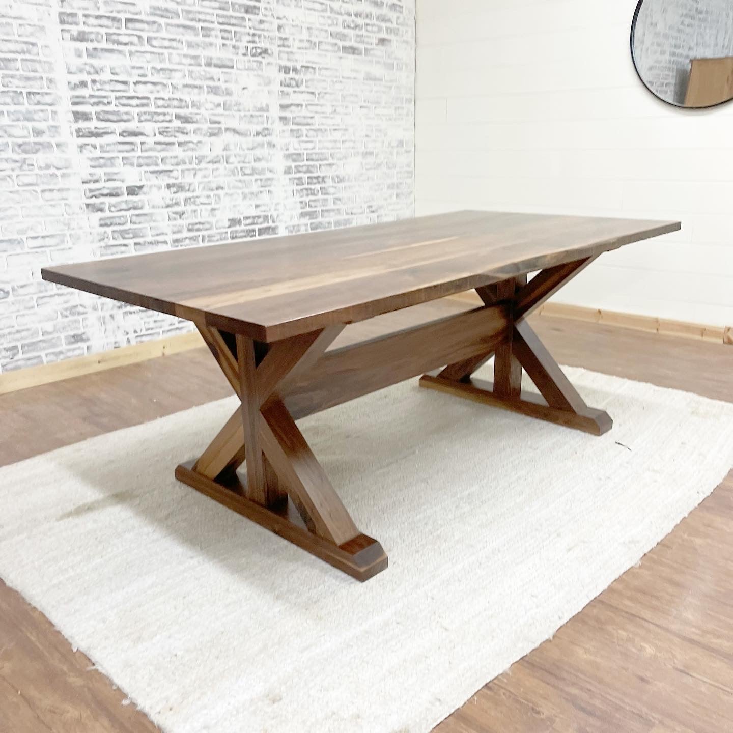 Picutred with a 7' L x 42" W Walnut table with a Natural Finish.