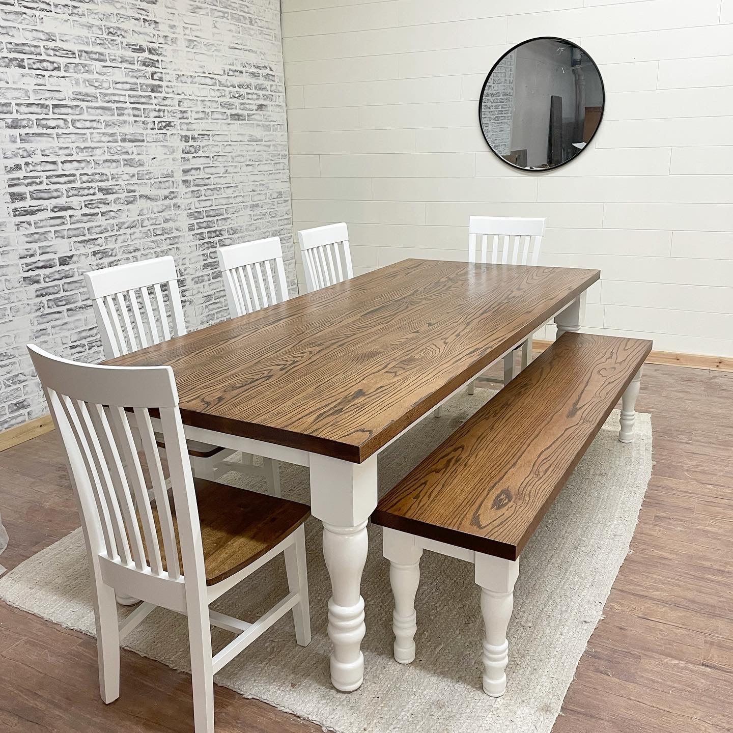 Pictured with an 8' L x 42" Red Oak top stained Honey with a painted White base. Pictured with a Matching Bench and 5 Mission Dining Chairs.