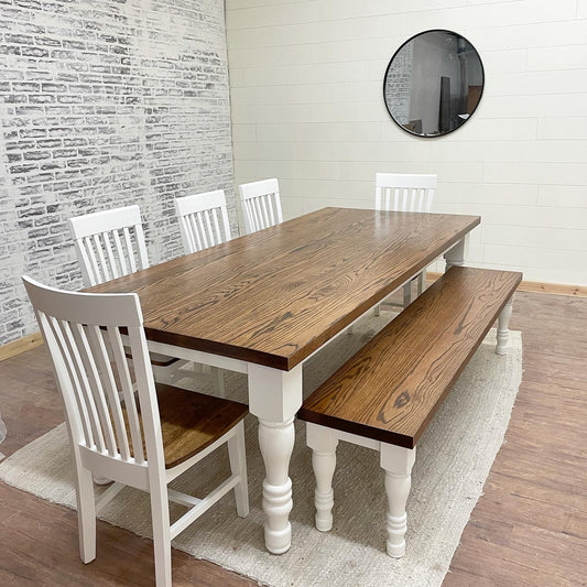 Pictured with an 8' L x 42" Red Oak top stained Honey with a painted White base. Pictured with a Matching Bench and 5 Mission Dining Chairs.