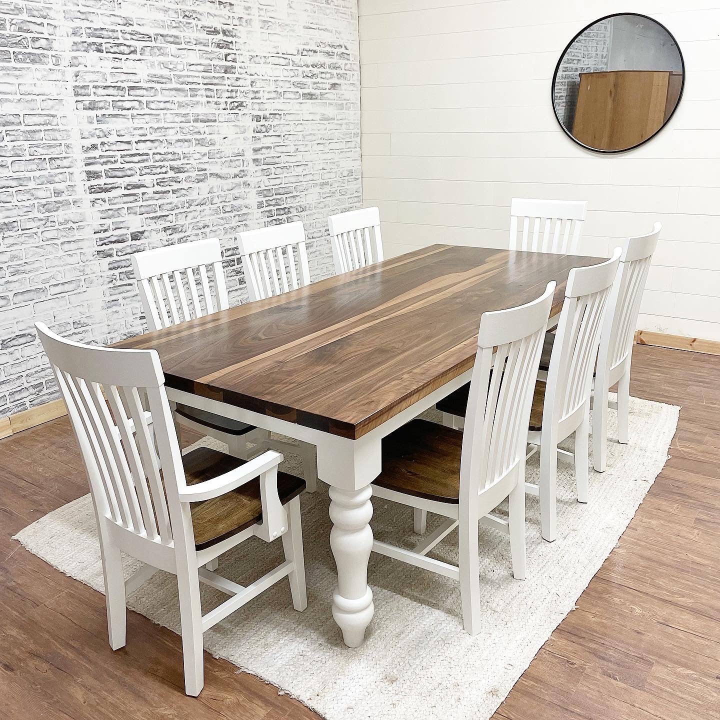 Pictured with an 8' L x 42" W Walnut top with a Natural finish and White painted base. Pictured with 6 Mission Chairs and 2 Captain Mission Chairs with seats stained to match the walnut top.