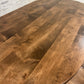 Pictured with a 54" L x 30" W Rustic Alder table stained Espresso..