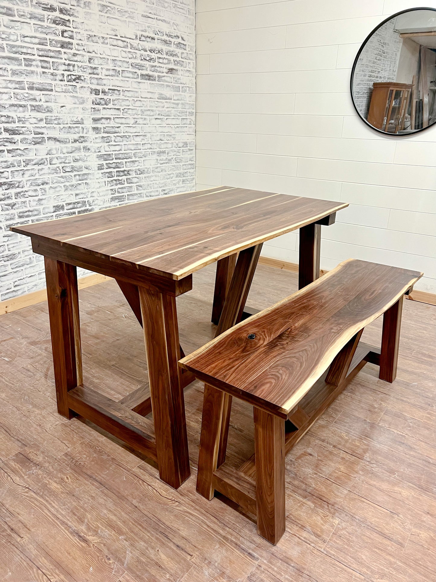 Pictured with a 5'L x 36" W Solid Walnut table and bench with a Natural finish.