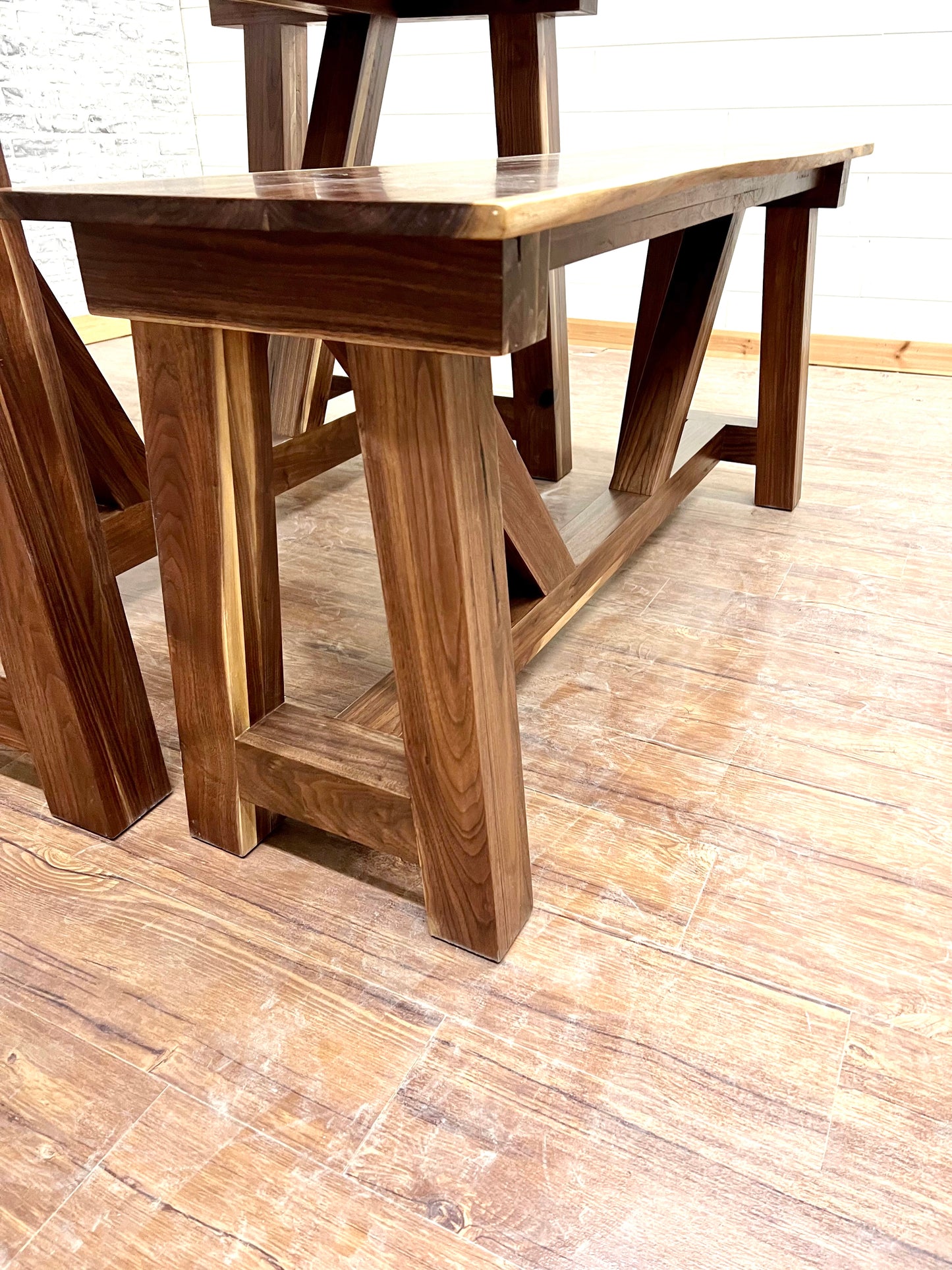 Counter Height Truss Bench in solid Walnut finish in a Natural finish..