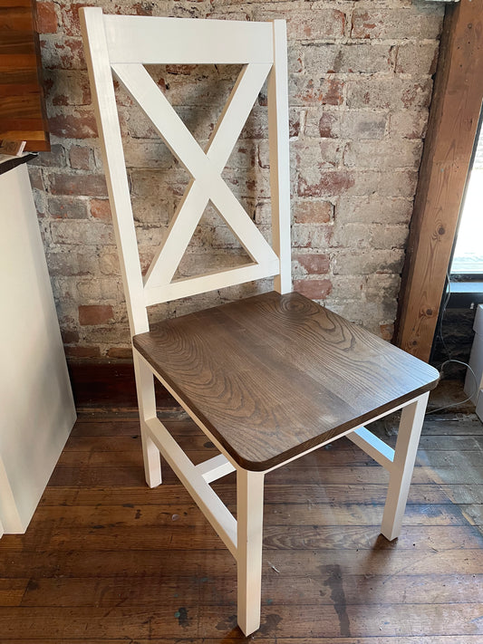 Pictured with a Custom made dining chair with a single X for a supportive back painted white with a espresso stained oak seat.