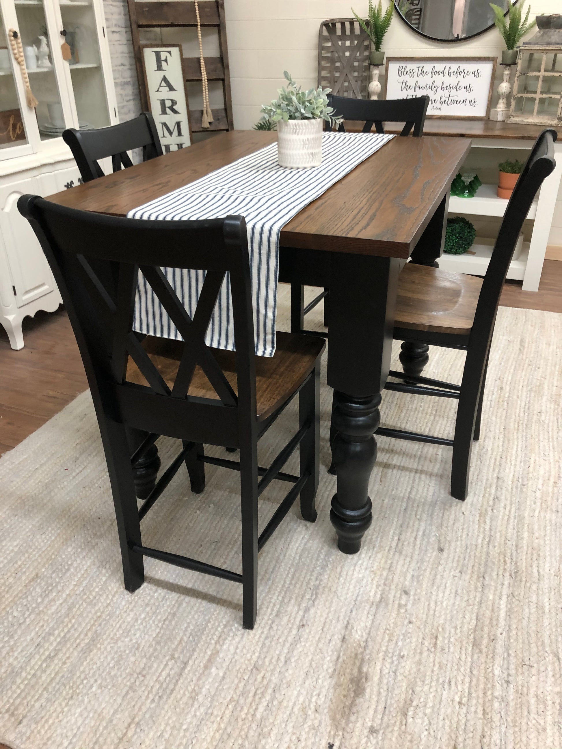 Pictured with a 4' L x 36" W Red Oak with Espresso stain and Black painted base. Pictured with 4 Double Cross Back Counter Height Stools..