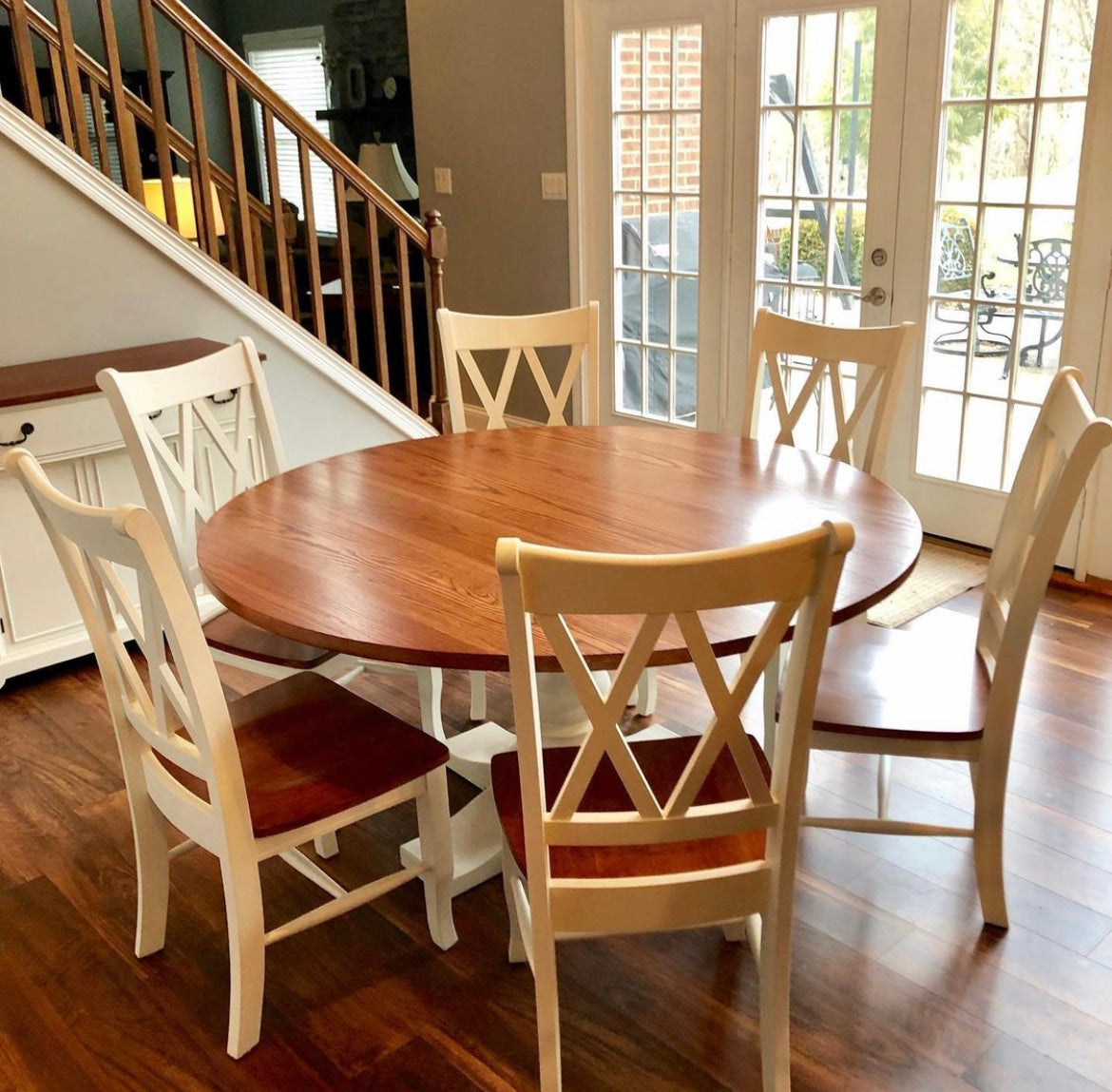 Pictured with a 60" W Red Oak table stained Cherry with a white painted base. Pictured with 6 Double Cross Back Chairs.